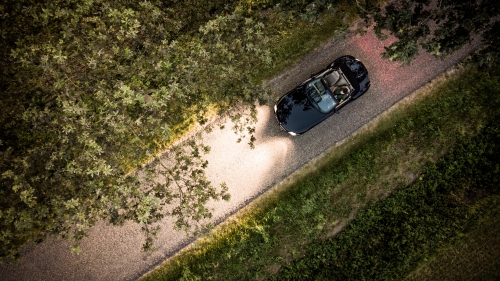 Aerial View on Convertible on Road