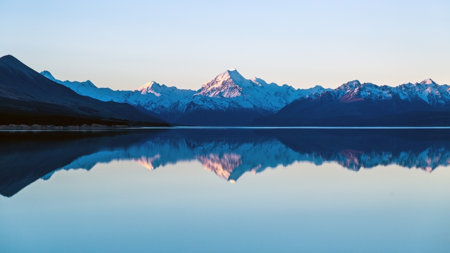 Amazing Beautiful Blue Sunset and Big Lake with Mountains