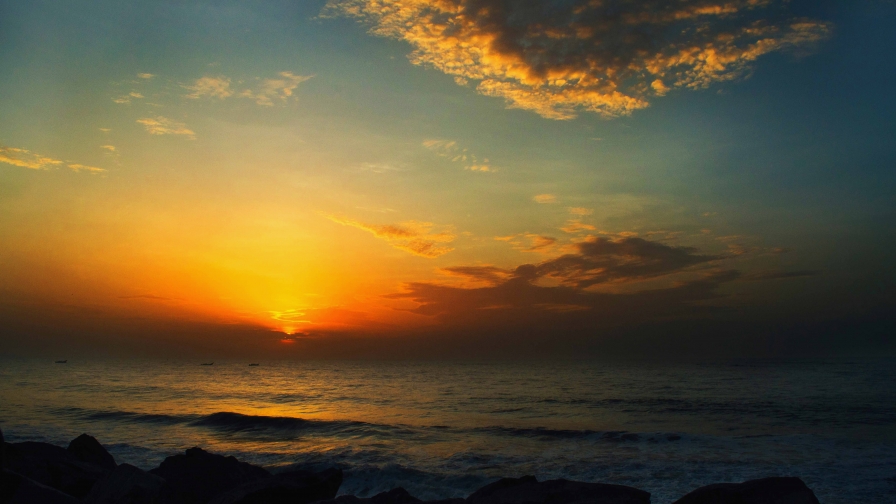 Amazing Beautiful Yellow Sunset and waves on the sea