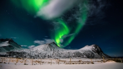 Beautiful Amazing Green Aurora and Mountains