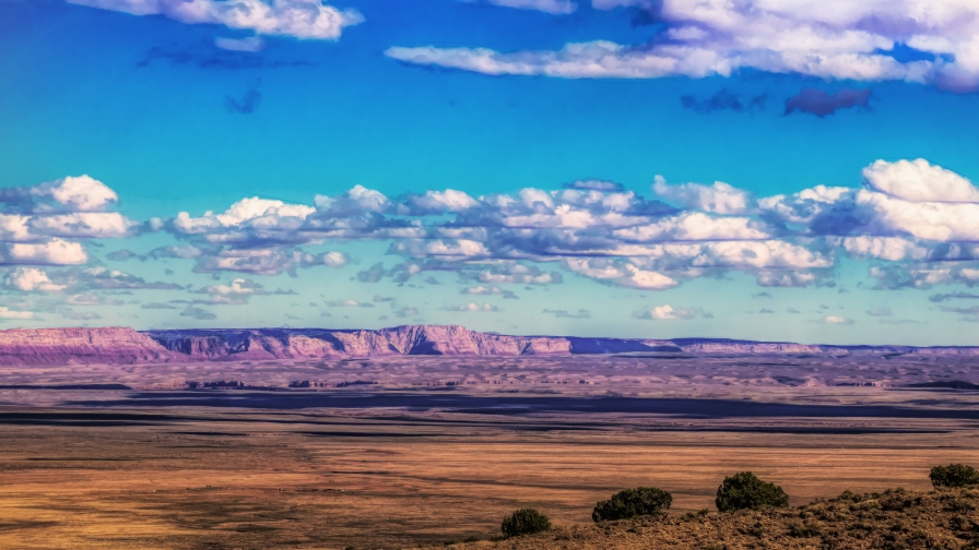 Beautiful Canyon and Clouds in Blue Sky