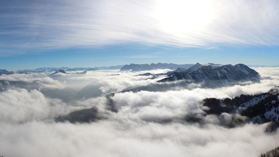 Beautiful Clouds in Mountains Valley and Sunlight