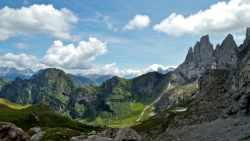 Beautiful Mountain Valley and Green Grass on Meadow