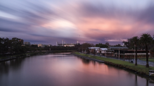 Beautiful Purple Sunset Sky River and City