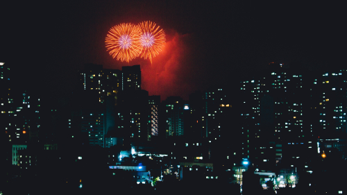 Beautiful Red Fireworks in Big City