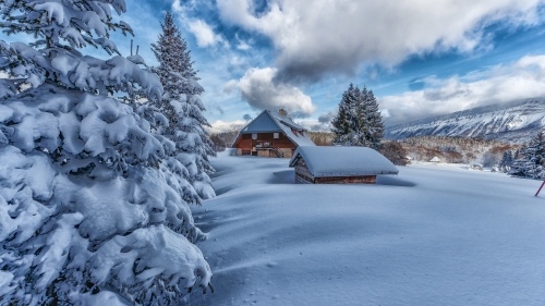 Beautiful Snow Covered Valley and Houses