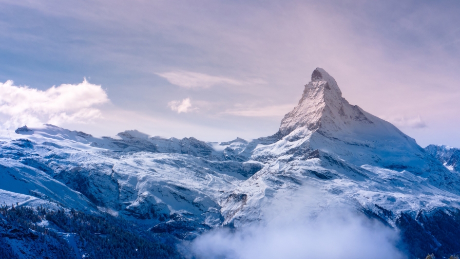 Beautiful Snowed Mountain Peak and Clouds