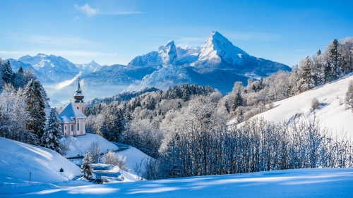 Beautiful Winter Mountains Valley and Church on the Hill