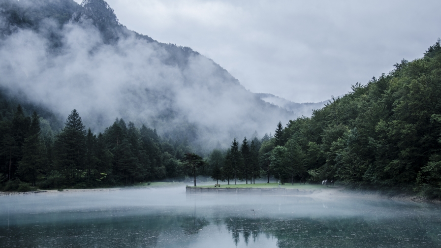 Black and Blue Fog on Lake and Mountain Valley