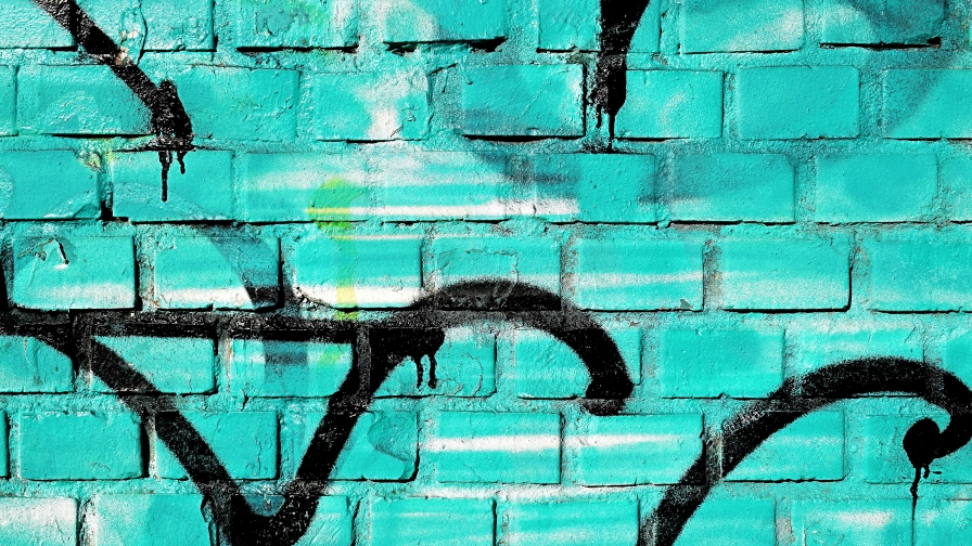Blue Brick Wall and Graffiti