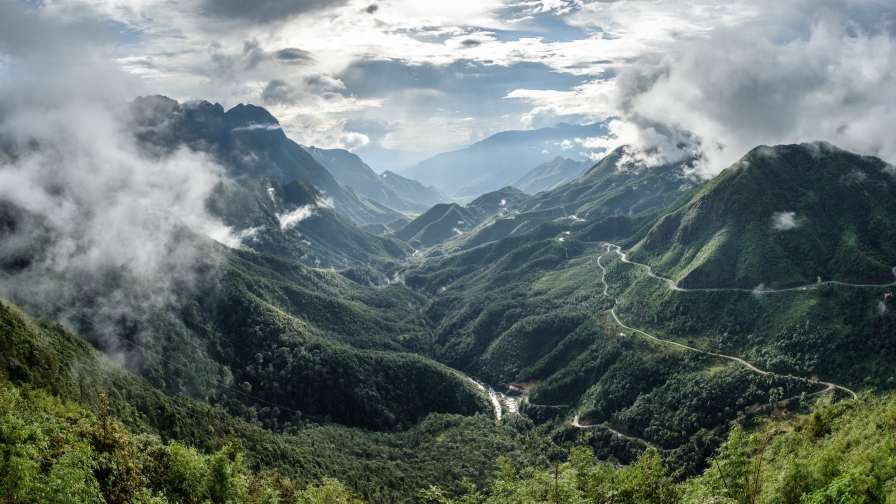 Clouds and sunlight in the mountain valley