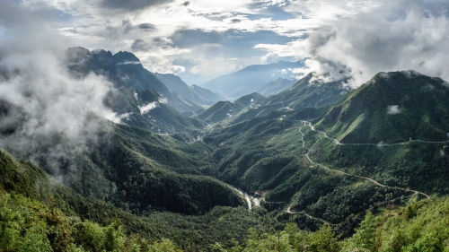 Clouds and sunlight in the mountain valley