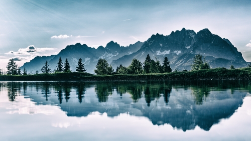 Crystal Pure Lake and Mountains with Forest