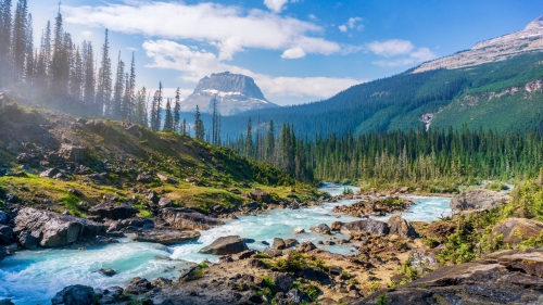 Flowing Water in Mountain Valley