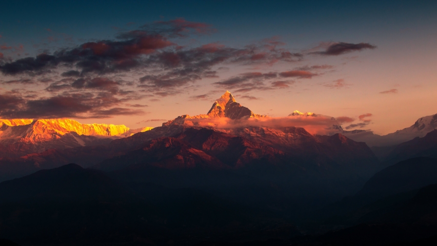 Himalayas and wonderful red sky with clouds