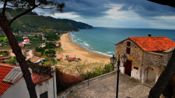 House on Slope and Beach