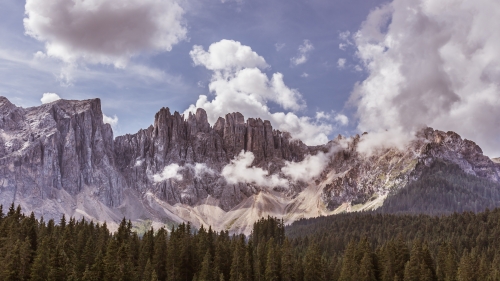 Karersee Dolomites Alps with Forest and Clouds