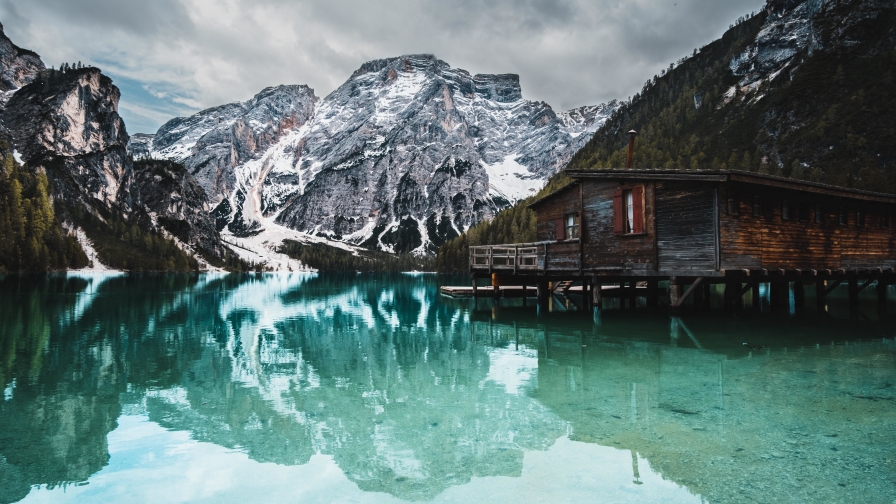 Lake and Wooden House on Shore