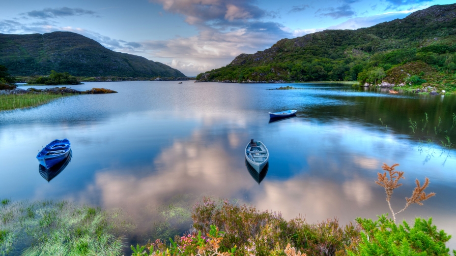 Lake in Mountain Valley and Boats