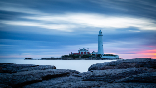 Lighthouse and Clouds in Sky