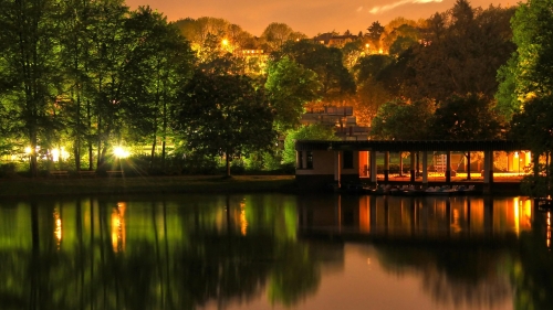 Night city garden and lake