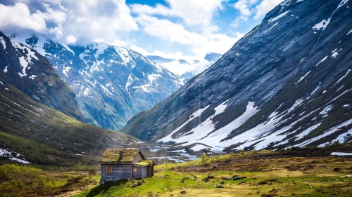 Norway Mountains and Single House in Valley