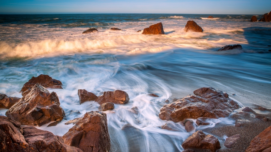 Pacific Ocean Coast Reef Waves and Red Rock