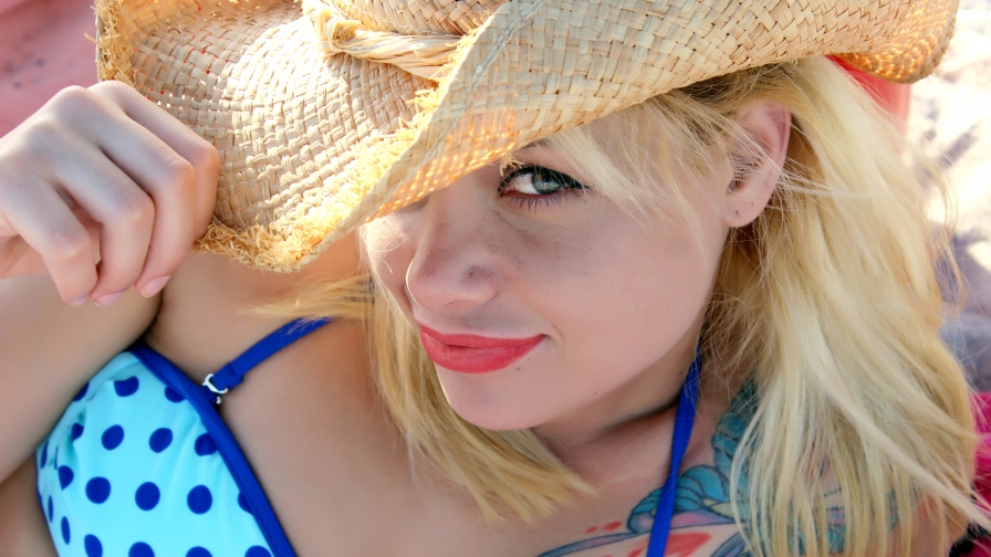 Pretty Blonde Girl in Blue Bikini