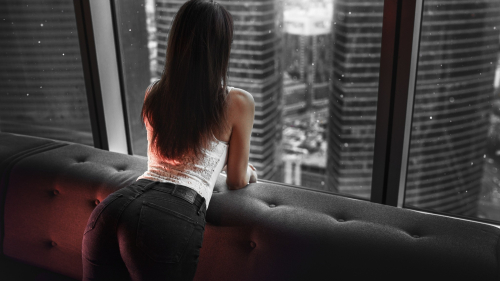 Pretty Young Lady and Big City in Window