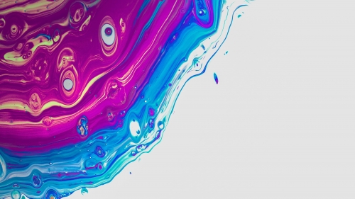 Purple Stains of Paint in Liquid