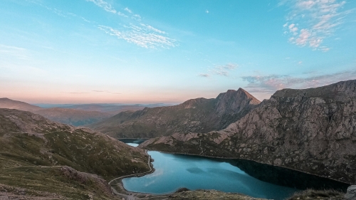 River in Mountain Valley and Sunset