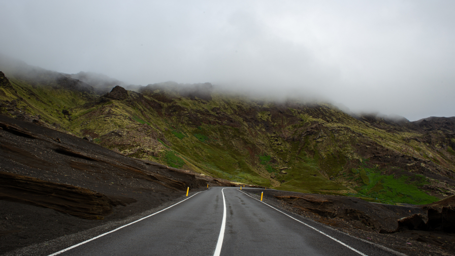 Road in Mountains and Fog on Hills