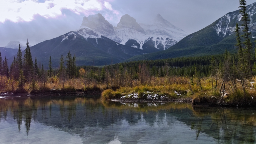 Rocks in Mountain Valley and Reflection on Lake