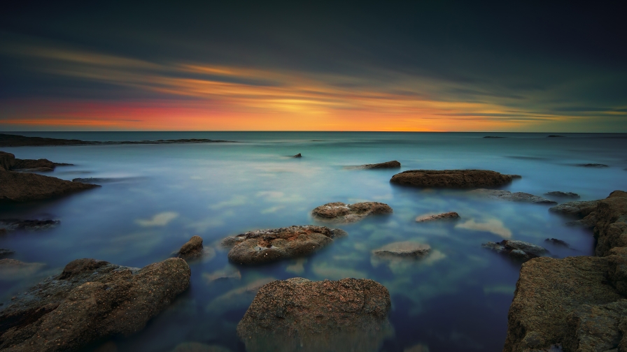 Rocks in Water and Beautiful Sunset