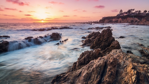 Rocks on Coast and Beautiful Waves