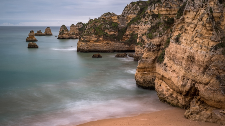 Rocks on Coast and Waves