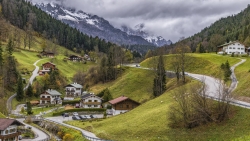 Single Village in Mountain Valley and Clouds