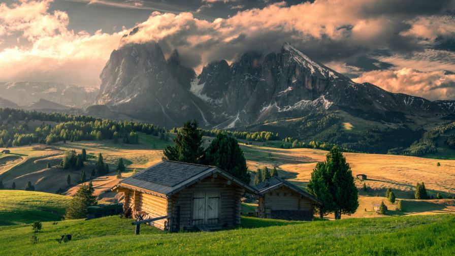 Single Woody House and Mountains on Background