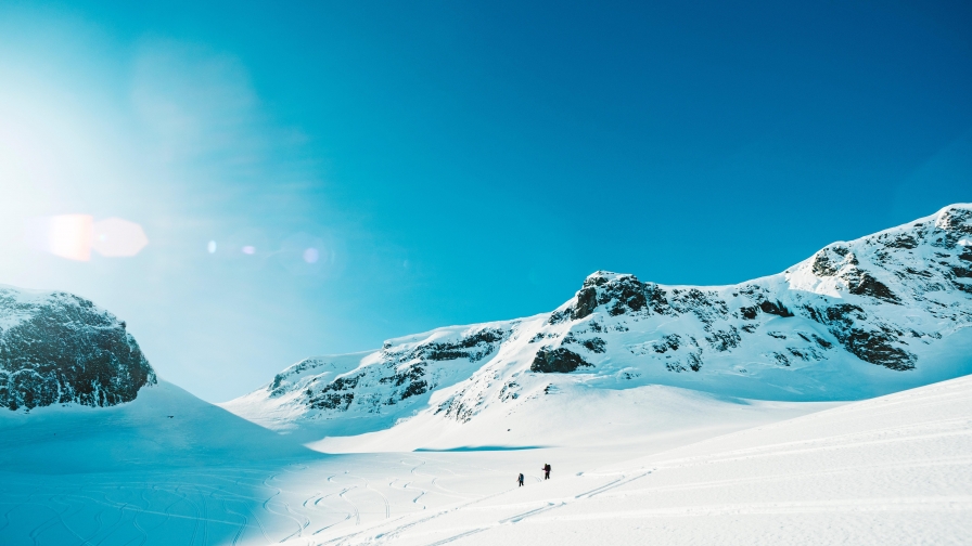 Skiers Tourists and Snow in Mountain