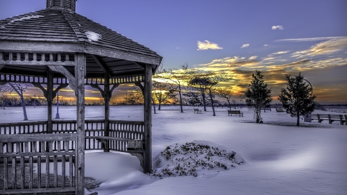 Snow and Fence in Home Garden