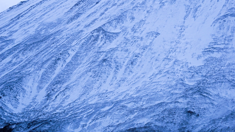 Snow Covered Slope of Mountain