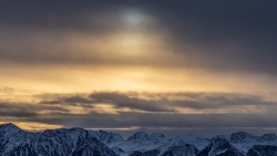 Snowed Mountains Peaks and Sunset