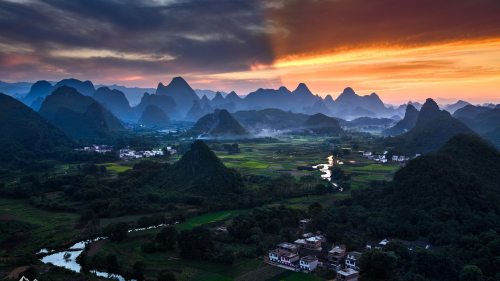 Village in Mountain Valley and River