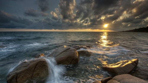 Waves and sunset beach